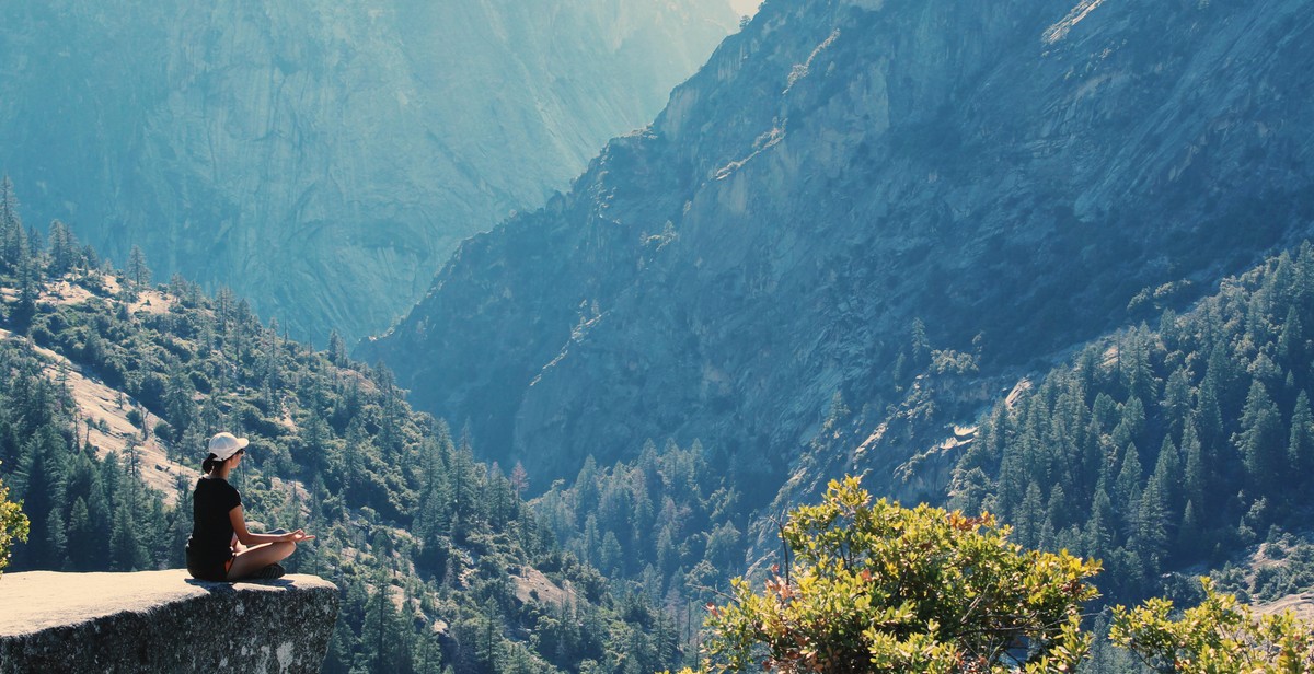 woman meditating in nature